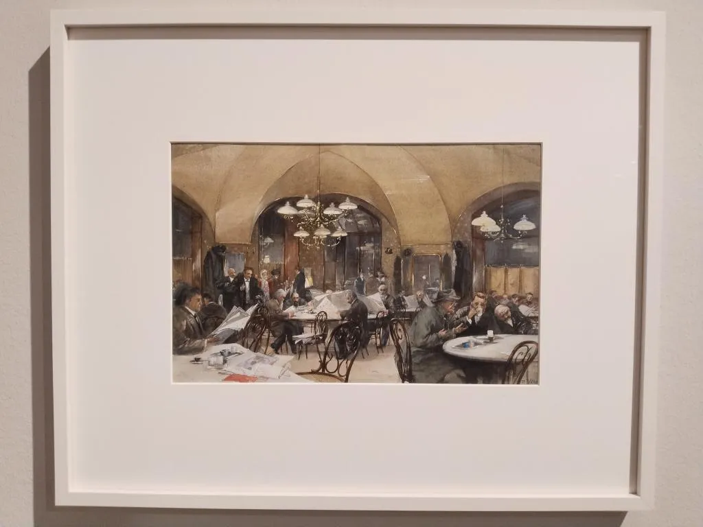 Painting of Café Griensteidl in Vienna by Reinhold Richard d. J. Völkel, showing guests reading newspapers and drinking coffee under arched ceilings, with Thonet bentwood Chair No. 4 used at the tables. The painting is exhibited in the Vienna Museum.
