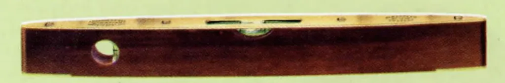 Illustration of John Rabone & Sons canoe-shaped spirit levels. No. 1625 is made from rosewood, and No. 1626 from walnut. Both feature a brass top plate, reinforced base, and are fitted with one level tube and one plumb tube. Sizes available: 6, 8, 9, 10, and 12 inches.