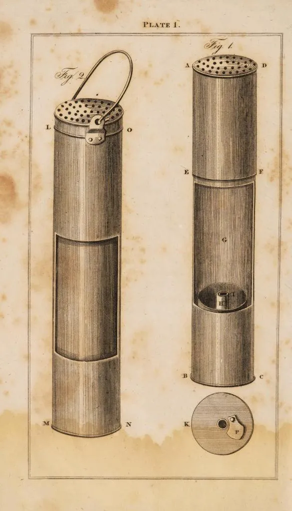 Detailed 19th-century diagram showing the construction of George Stephenson’s early Geordie Lamp, including glass cylinder, oil chamber, air intake tubes, and protective casing.