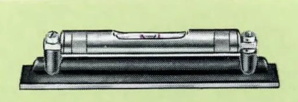 Black-and-white illustration of John Rabone & Sons engineers’ iron spirit level (No. 1381) with nickel-plated revolving tube protector, shown mounted on a grooved iron base. Offered in 4, 6, and 8 inches.