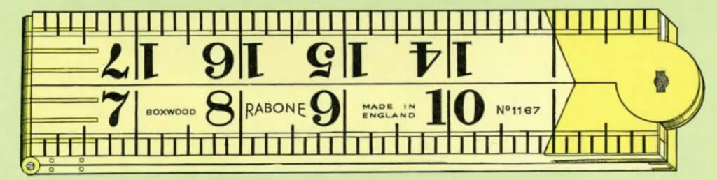 Close-up of a Rabone No. 1167 Blindman’s folding boxwood rule with large black numerals, brass V-joint, and Made in England stamp.