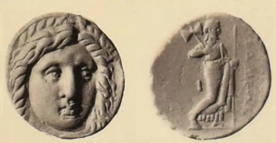 Antike griechische Silber-Tetradrachme des Hidrieos von Karien in Vorder- und Rückseitenansicht; die Vorderseite zeigt den frontal dargestellten, lorbeerbekränzten Kopf des Apollon, die Rückseite Zeus nach rechts mit der Legende ΙΔΡΙΕΩΣ und dem Buchstaben I im Feld.