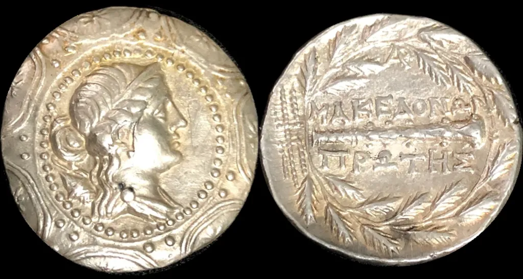 Ancient Greek silver coin from Macedon in Macedonia, shown in two views, with a right-facing head set inside an ornate Macedonian shield on one side and a club framed by an oak wreath and Greek inscription on the other.