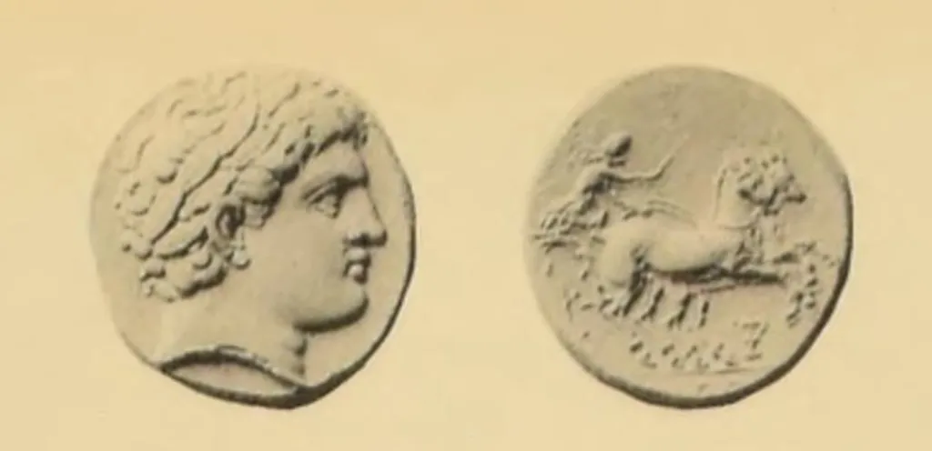 Goldstater Philipps II. aus Makedonien mit dem lorbeerbekränzten Kopf des Apollo und einer von einem Wagenlenker geführten Biga mit Kantharos unter den Pferden.