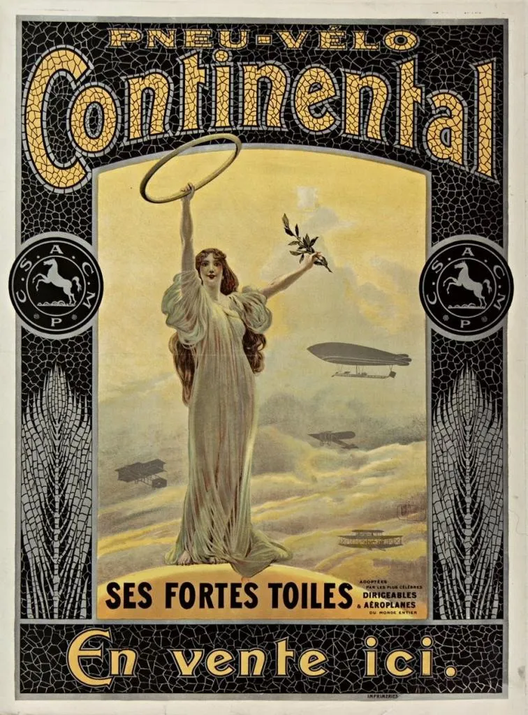 Bild: Dieses Jugendstil-Poster wirbt für Pneu-Vélo Continental-Fahrradreifen und hebt deren starkes Gewebe (Ses Fortes Toiles) hervor. Die elegante Frau symbolisiert den Sieg, indem sie einen Reifen und einen Olivenzweig hält. Im Hintergrund sind Luftschiffe und Flugzeuge zu sehen, die mit Continental-Ballon- und Flugzeugstoffen ausgestattet waren. Die Anzeige endet mit En vente ici (Hier erhältlich).<br>Quelle: Gallica - Bibliothèque nationale de France 