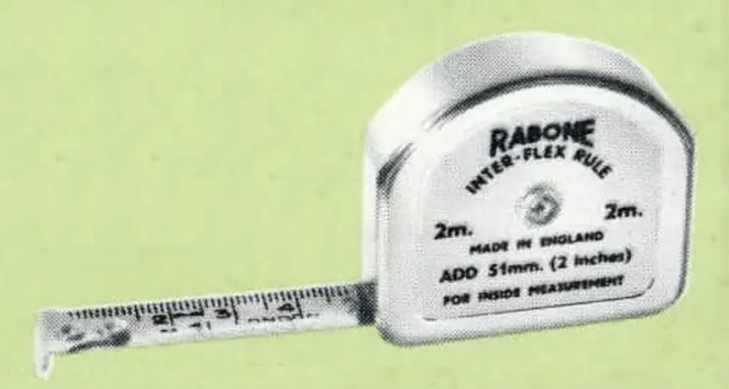 Vintage Rabone Inter-Flex Pocket Measure No. P311, showing a 2-inch wide chrome-plated D-shaped case with a ½ inch wide tape, marked in imperial and metric units up to 2 metres.