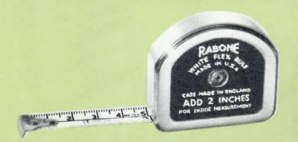 Rabone White Flex Pocket Measure No. P.3405, 2 metres long with a ½-inch wide white blade and black figures for contrast, enclosed in a 2-inch D-shaped case. Markings include 16ths, 32nds, and millimetres.