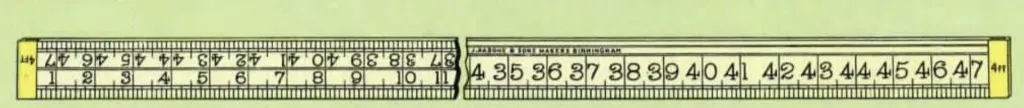Detailed image of a Rabone No. 1139 straight bench rule, showing three lines of inch divisions in 1/8' increments, numbered from both ends, with boxwood body and brass tips.