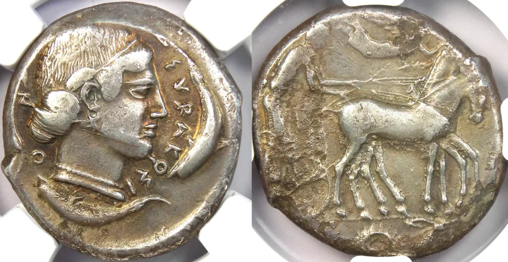 Two-view photograph of a Syracusan silver tetradrachm in a holder, showing on the obverse a female head facing right with hair bound in a sakkos and dolphins around the portrait, and on the reverse a worn quadriga scene moving right.