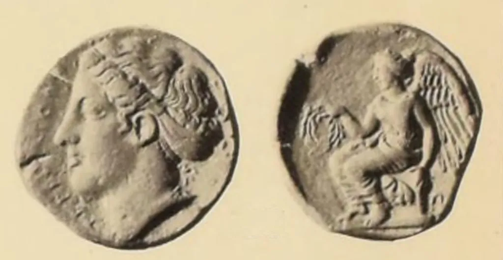 Ancient Greek silver didrachm of Terina in Bruttium, shown in two views, with the head of Nike facing left on the obverse and Nike seated left on a cippus with wreath on the reverse.