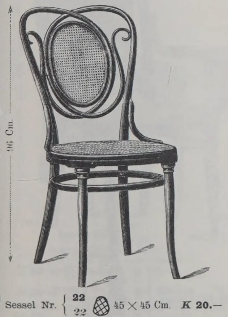 Illustration of Thonet bentwood chair Model No. 22 from the 1904 Gebrüder Thonet catalogue, featuring an oval cane backrest framed by elegant swirling bentwood and a round cane seat.