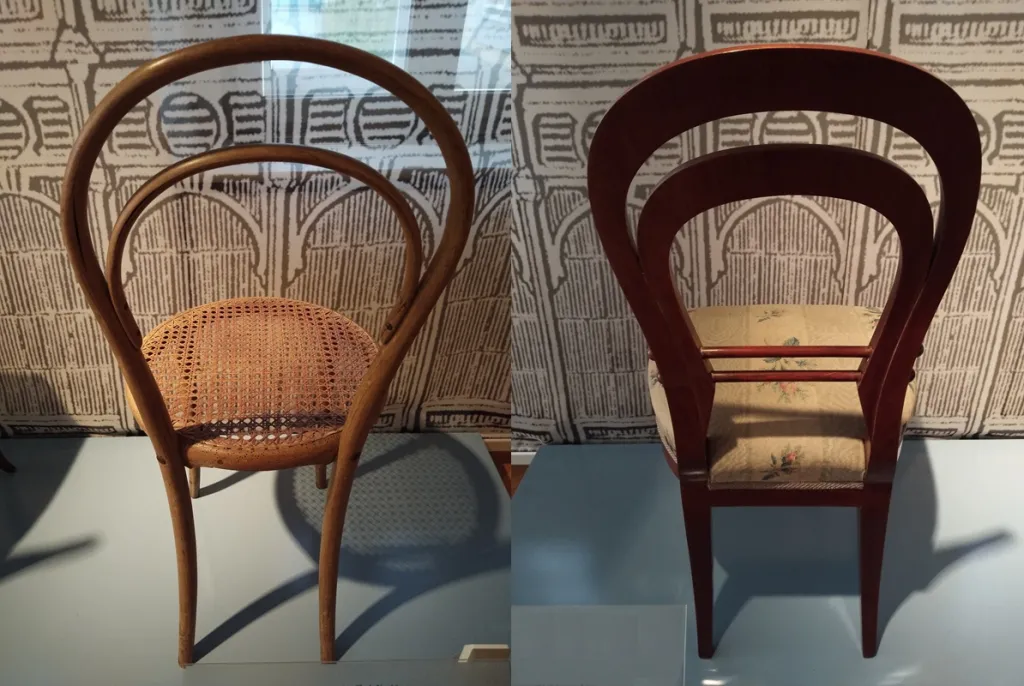 Collage image showing two chairs side by side: left, a Thonet bentwood Chair No. 14 with a cane seat; right, a Biedermeier chair from Laxenburg with a solid wood frame and upholstered seat, which served as a model for Thonet’s design.