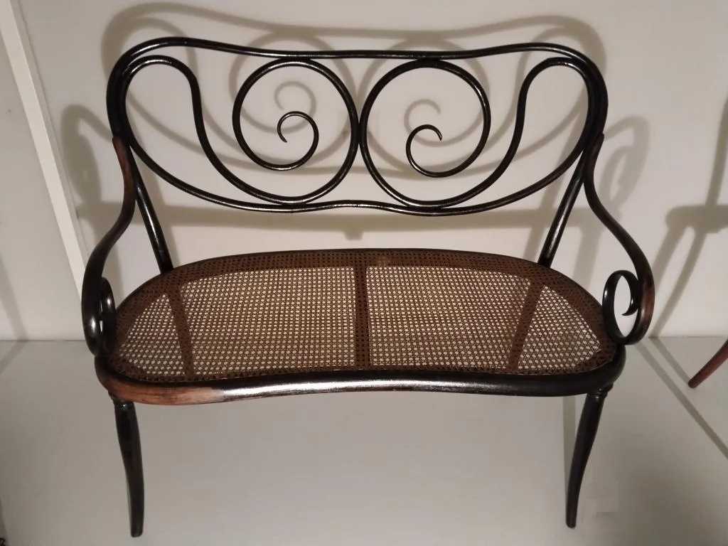 Thonet settee model no. 1 in bentwood beech with cane seat, designed by Michael Thonet around 1850, produced by Gebrüder Thonet around 1860.