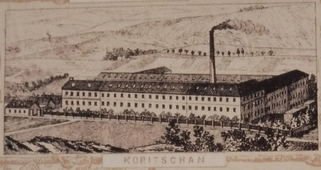 Engraving of the Thonet factory in Koritschan, Moravia, showing a large industrial building with smoking chimney, surrounded by hills and countryside.