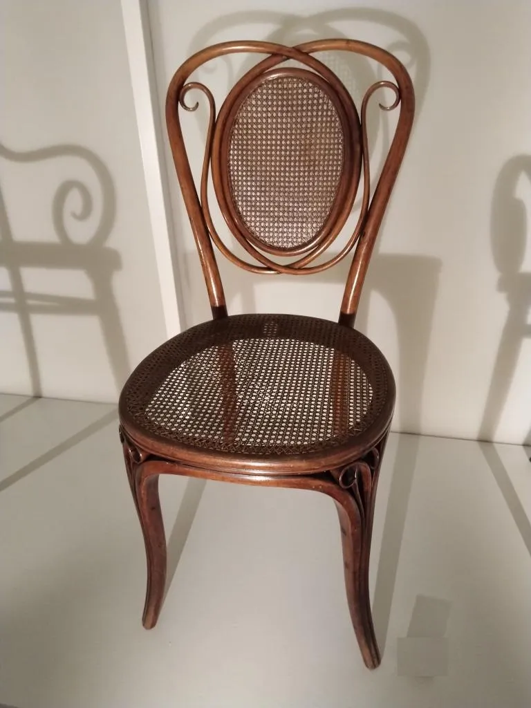 Thonet chair model No. 22 for the Palais Pálffy in laminated and solid bent beech with cane seat and backrest, designed and produced by Gebrüder Thonet around 1865.