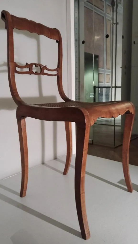 Simplified Boppard chair by Thonet with gently curved legs and single carved backrest rail, showing early laminated wood construction.