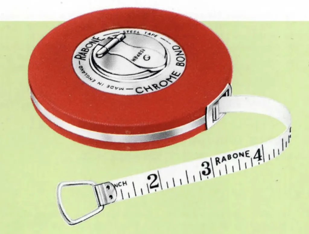 Close-up of a vintage Rabone White Bond Steel measuring tape in a red case, with white tape extended showing black markings and a metal loop end.